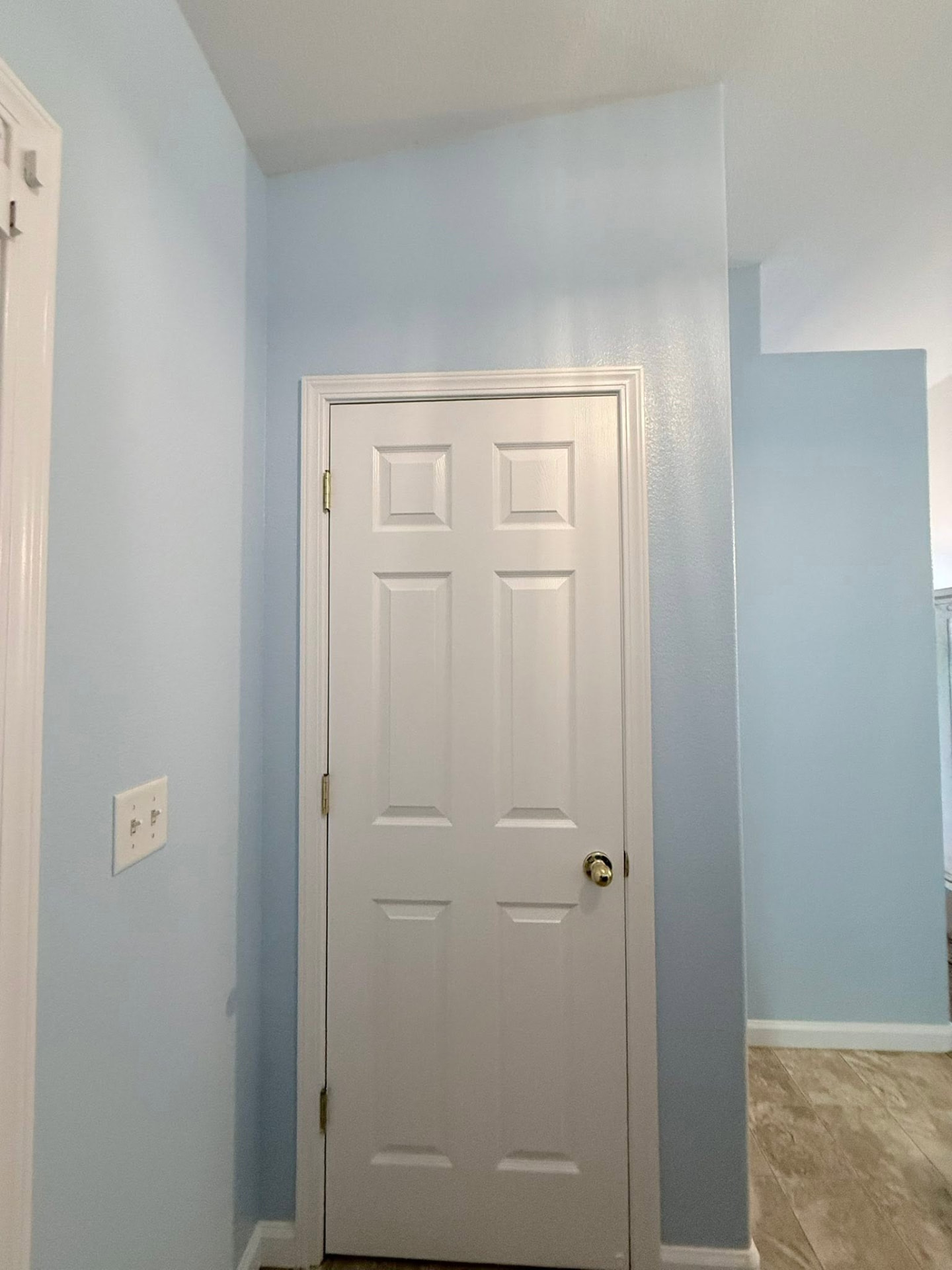 Hallway walls, doors and trim repainted end to end