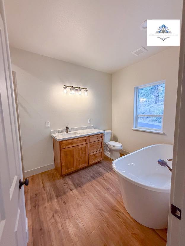 Bathroom walls and vanity area finished in a clean washable enamel