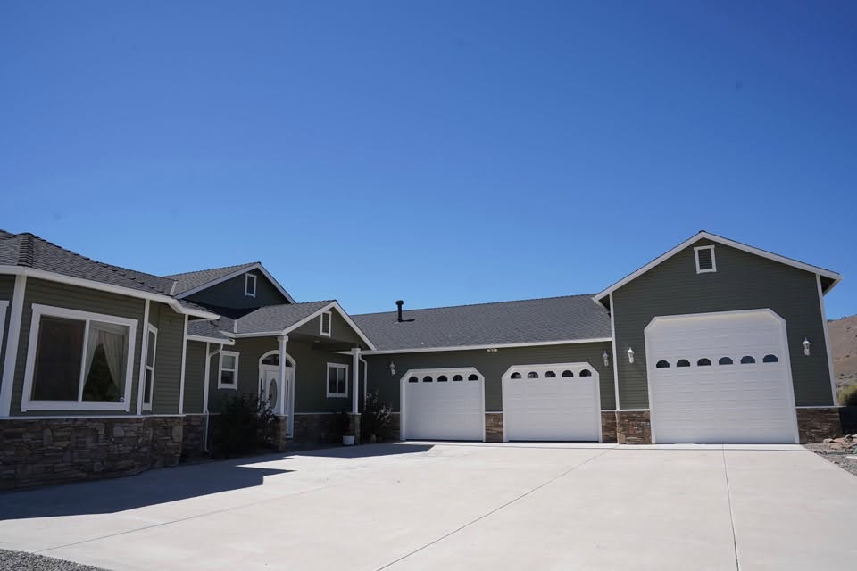 Ranch home body, trim and three garage doors